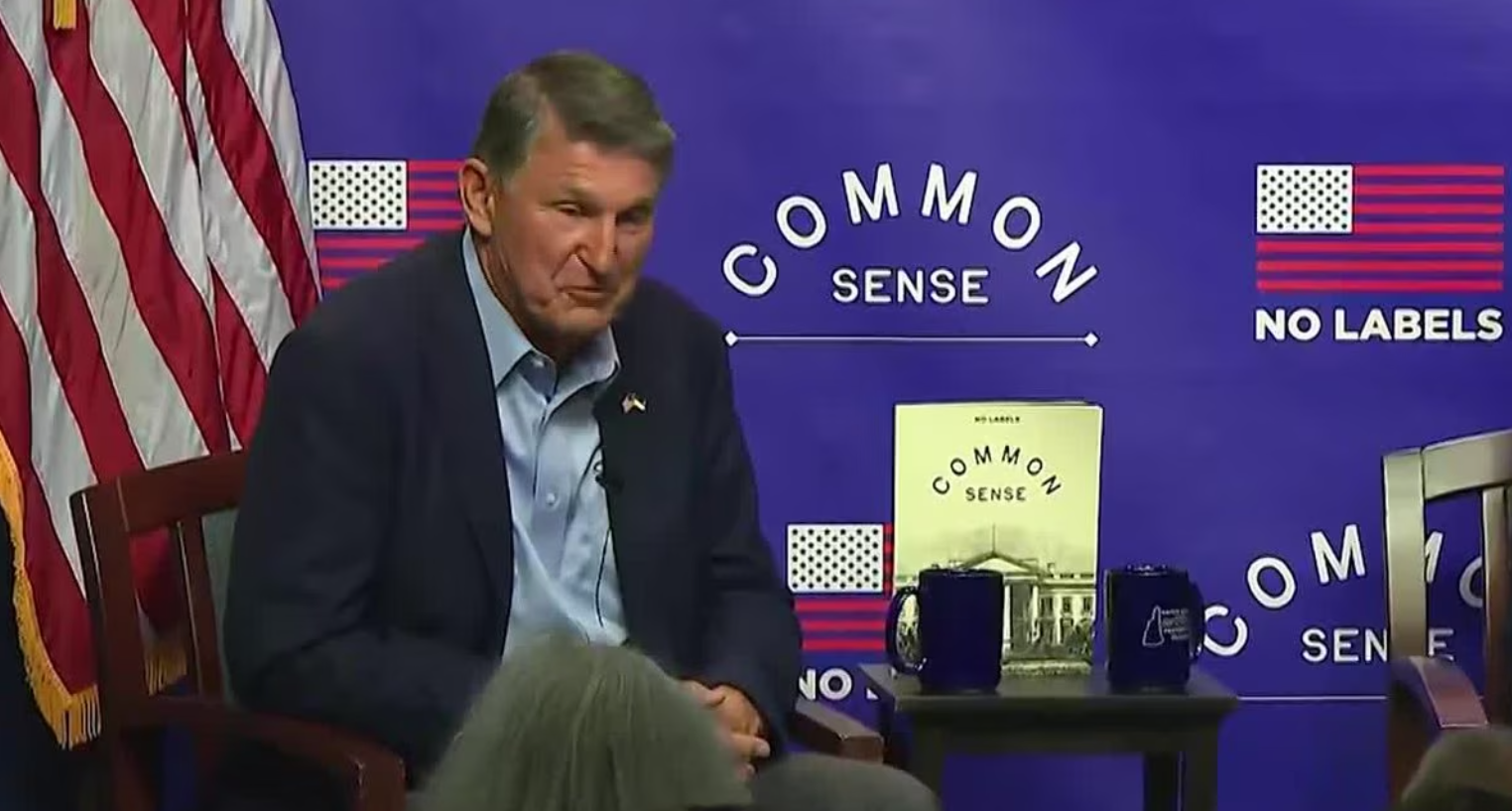 senator joe manchin speaking at a town hall in New Hampshire hosted by the interest group No Labels